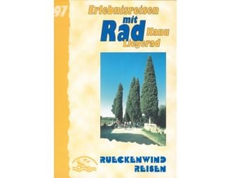 Titelseite des Rückenwind Radreisen Katalogs 1997 mit drei hohen Zypressen und Radfahrern auf einem Weg unter blauem Himmel, gelber Rand.
