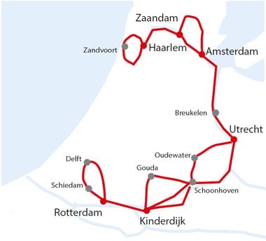 Map showing cycling route through South Holland connecting Amsterdam, Haarlem, Utrecht, Rotterdam, Delft, and other Dutch cities with red line.