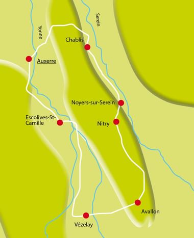 Stylized green map showing cycling route through Northern Burgundy with red dots marking towns: Auxerre, Chablis, Noyers-sur-Serein, Nitry, Vézelay, and Avallon.